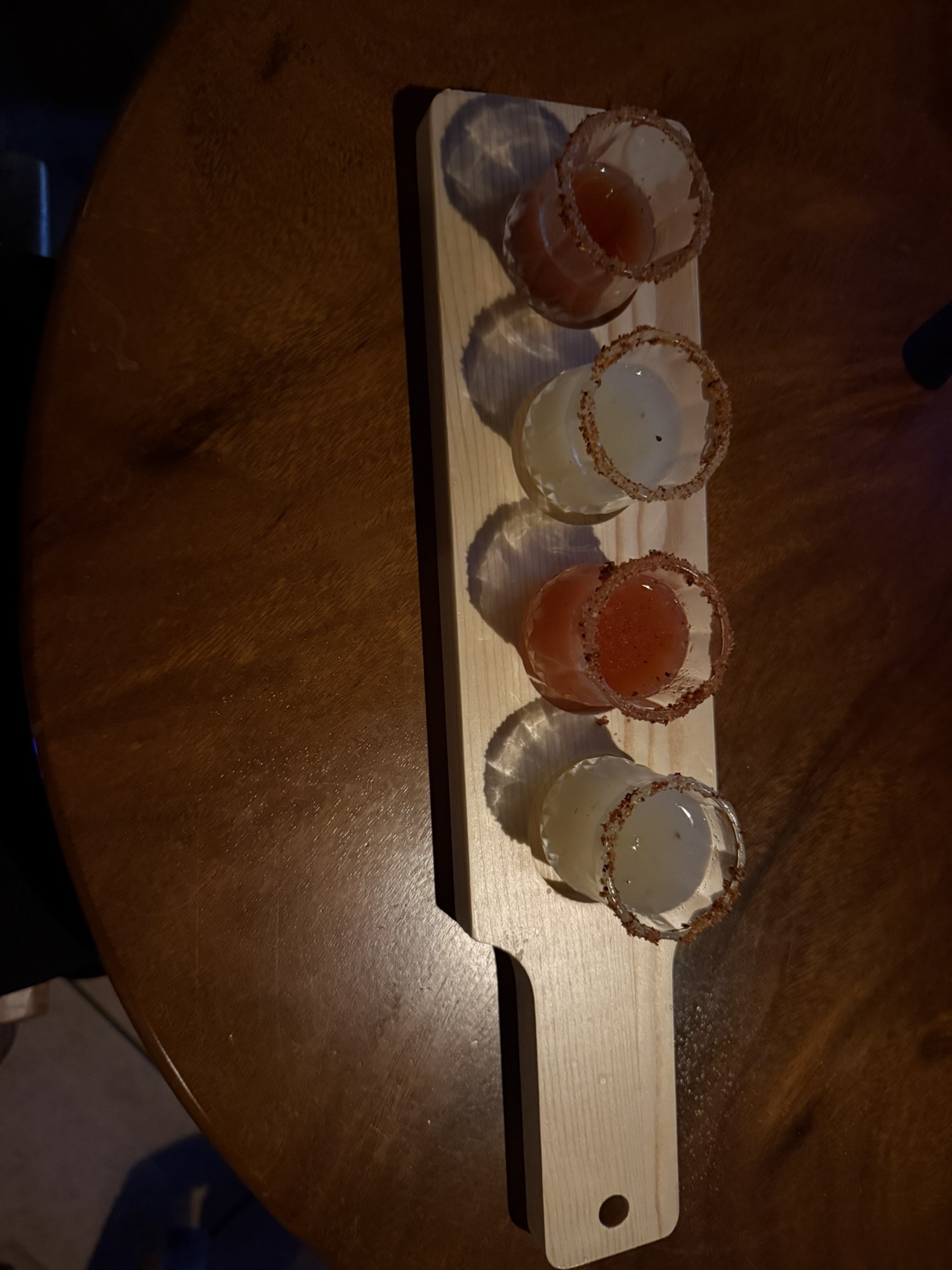 Flight of shots on a wooden paddle
